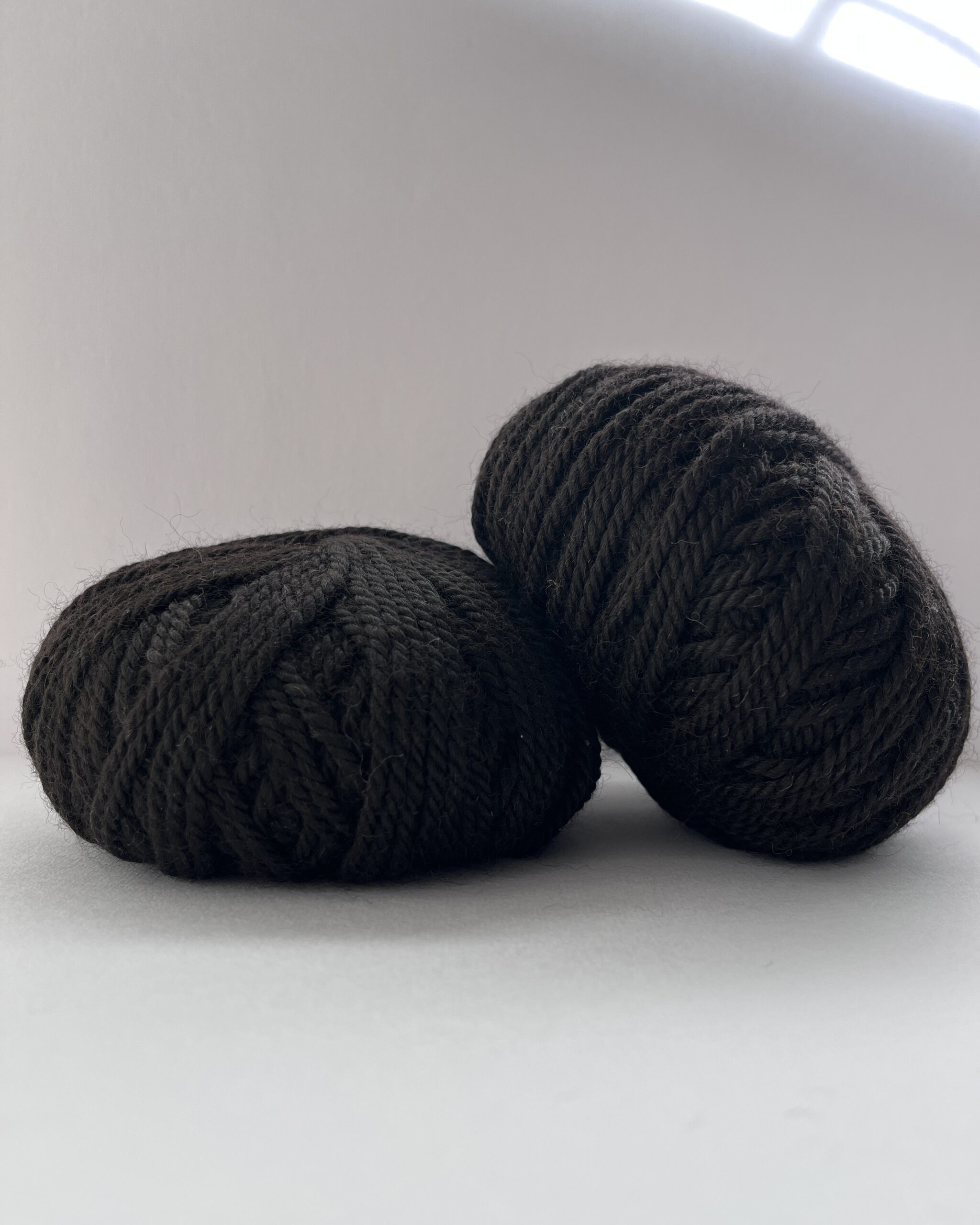 Redens Bay Black British alpaca yarn close-up showing natural Bay Black colour